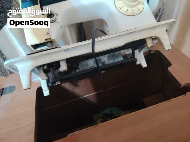 ماكينة خياطة مستعمل للبيع ماركة سنجر