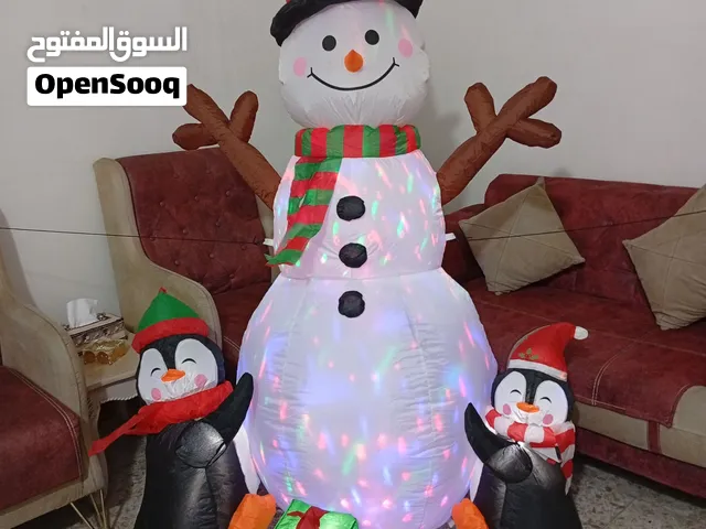 دميه رجل الثلج مع البطاريق قابلة للنفخ
