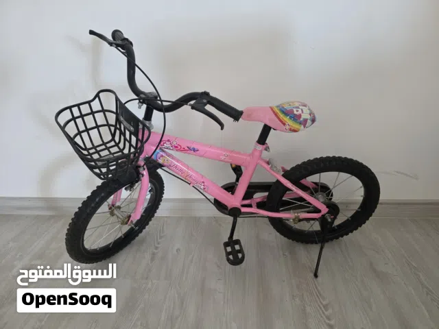 Pink kids bicycle for ages between 3 to 7 years