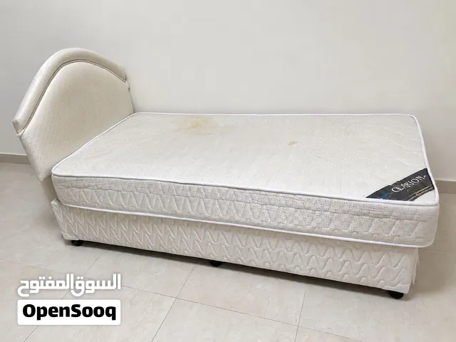 Single bed with mattress and base - used some stains
