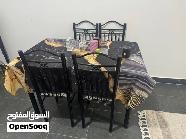 طاولة طعام + 4 كراسي