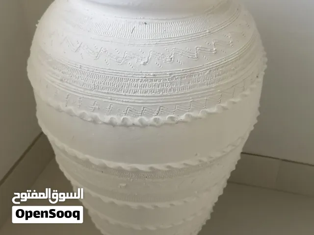 Clay pot painted in white
