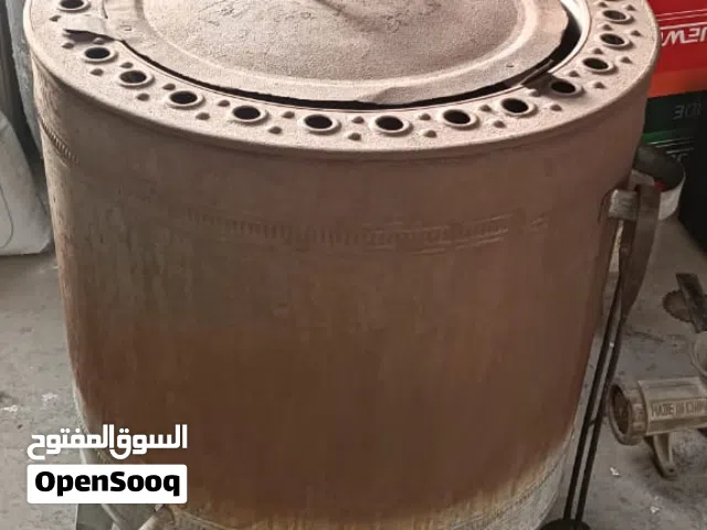 تنور مع منكاش