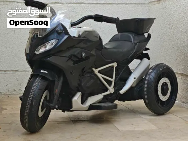 دراجة أطفال كهربائية ثلاثية العجلات تصميم BMW موديل رياضي.