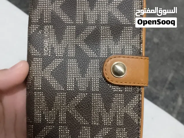 حافظه جواز السفر من شركه مايكل كورس