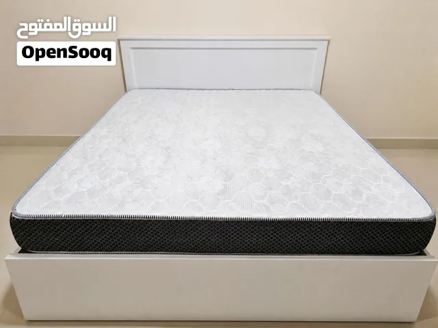 Queen-size mattress in good condition (used) - firm support and one side soft
