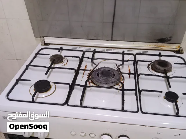 SOFA 3 SEATER AND KITCHEN STOVE FOR SALE