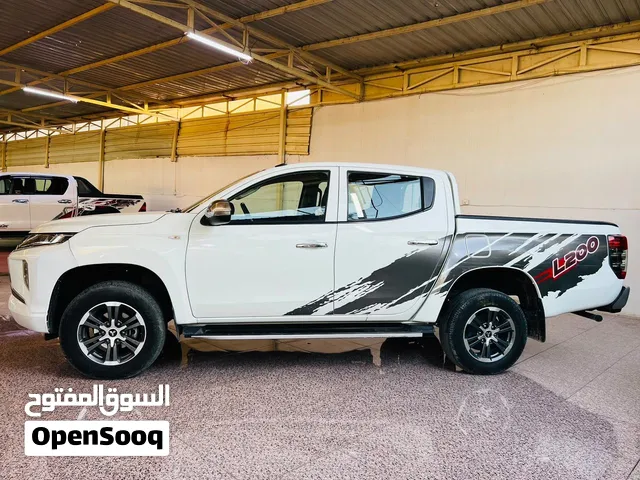 مسيوبيشي دبل قمارة موديل 2022 نظيفه و حلوة و لطيفه خير من الله عليها كل الاعتماد بيها ستين الف حظ