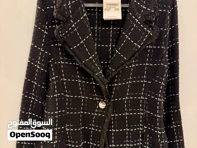 بليزر نسائي وشنط نسائي وقبعات شور