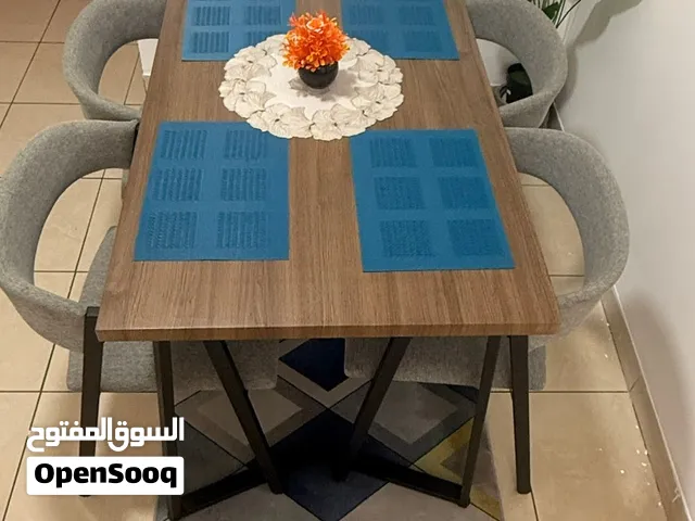 Branded Dining Table with 4 Chairs – Like New