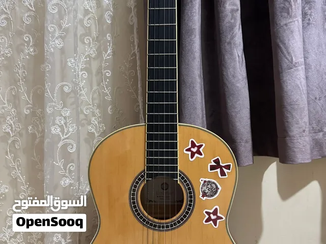 قيتار كلاسيك جديد للبيع