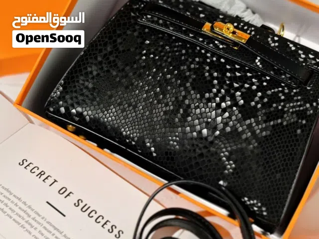 حقيبة هرمز جلد طبيعي