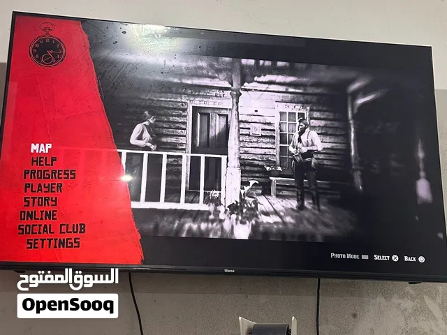 للبيع شاشة وأنسا 50 بوصة و ترابيزة صغيرة و ترابيزة خشب كبيرة و كرسي