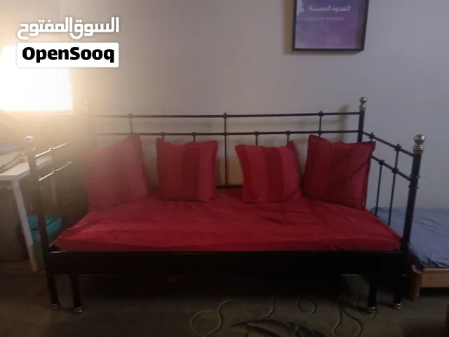 Bed for sleeping and sitting