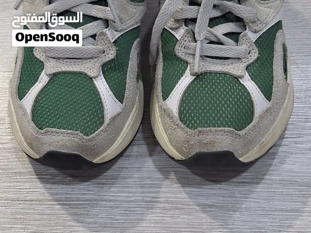 green nike Al8 shoes