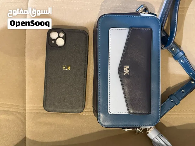 شنطة مايكل كورس لون أزرق وسماوي