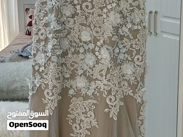 فستان سهرة فخم – ملبوس مرة واحدة
