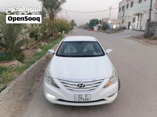 سوناتا موديل 2013 رقم بغداد انكليزي باسمي بيه صبغ باب الصدر والباقي كفاله محرك كير تخم تاير