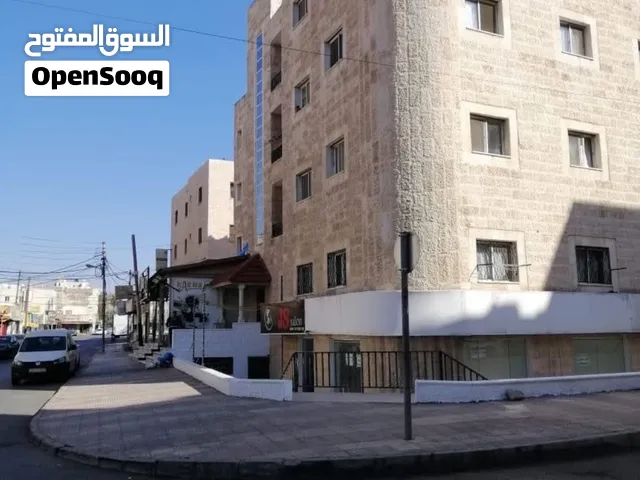 عمارة استثمارية مميزة للبيع في اربد / بعدد 11 شقة وست محلات وغرفة تسوية ايضا مؤجرة