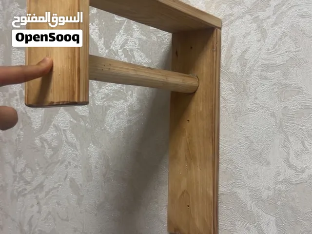 علاق ملابس خشبي