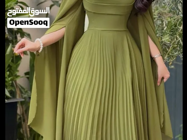 تصميم وخياطه فساتين حسب الطلب