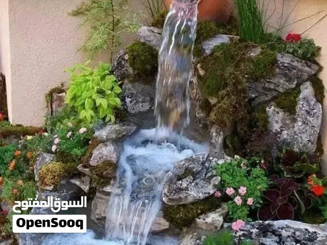 شلالات ونوافير نحت يدوي اسمنتيه وباضافات نباتاتيه طبيعيه وصناعيه