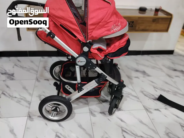 عربة اطفال كبيرة قابله للتفكيك والتركيب السريع بعجلات كبيرة قابله للنفخ تشبه عجلات الدراجة نظافة 95٪
