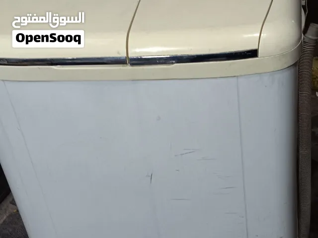 غساله جنرال 8  كيلو   كرت   شغال غسيل ونشاف   كل قطعها الوكاله موجود فديو