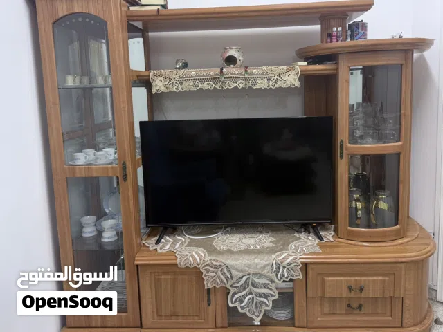 Large Solid Wood Entertainment Center – Fits 55 TV(2.16m Wide)/like new/ Price: 1000 aed Negotiable