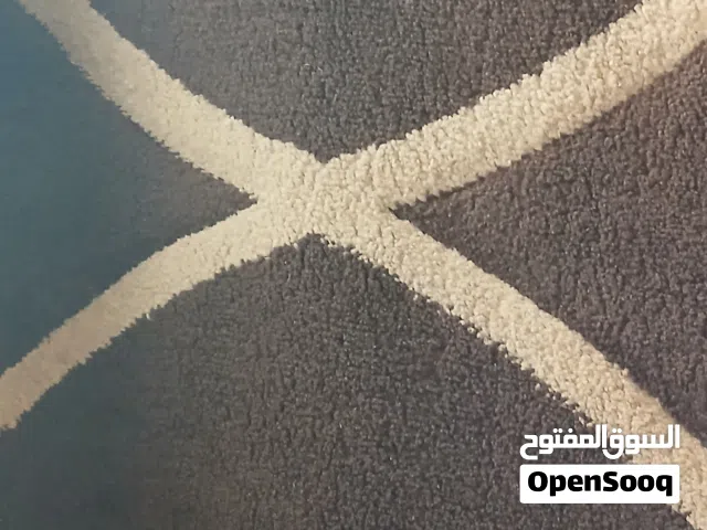 سجادة تركي اصلي ، مترين و ثلاثين ب ثلاثة متر ، بحالة ممتازة. البيع بسبب تغيير الديكور ، اللون بني