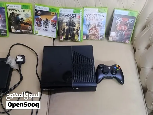 xbox 360 e series  with one controller cable and 6 games for 380