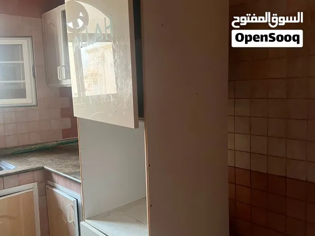 Tall and slim cuboard with middle open space for microwave. Quality coating