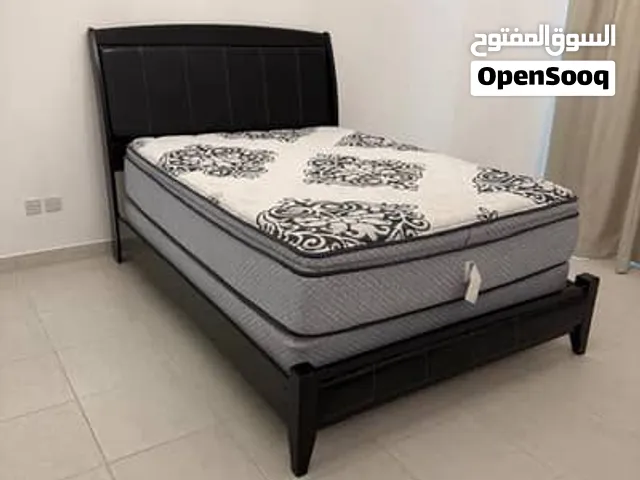 Queen size Mattress with bed frame and side table for sale