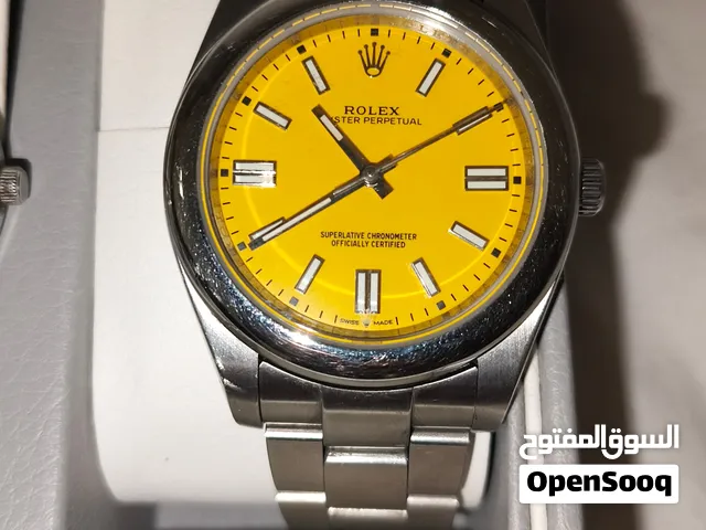 Used Rolex Oyster Perpetual with a striking yellow dial. Excellent condition and functions perfectly
