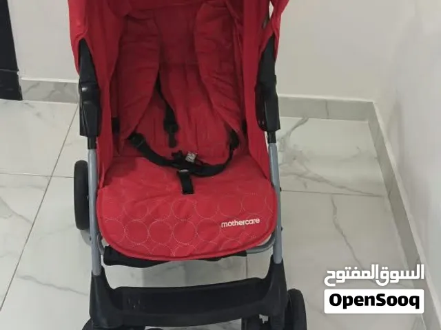 للبيع للبيع عربة أطفال من ماركة LuvLap (موديل Sunshine) بلون كحلي مع تفاصيل برتقالية ونقاط دائرية مل