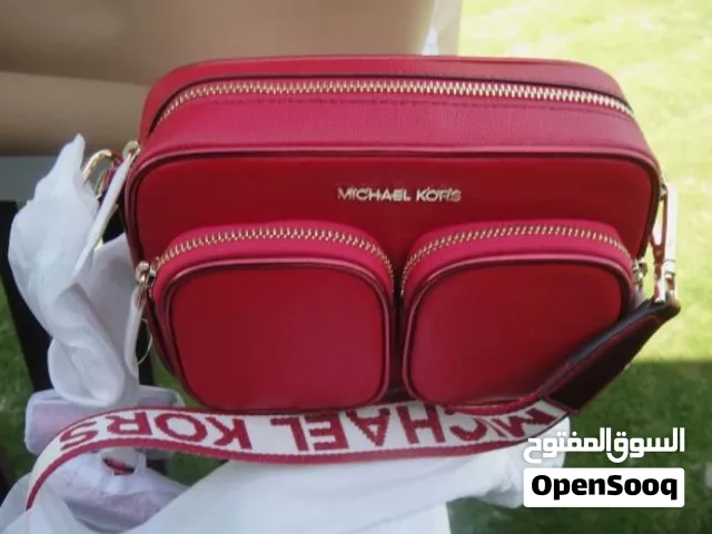 مايكل كورس شنطة يد احمر اصلية