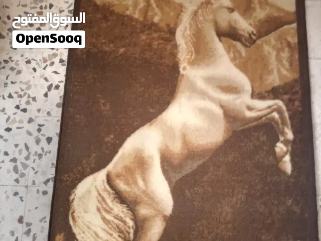 سجاد تعليق الحصان