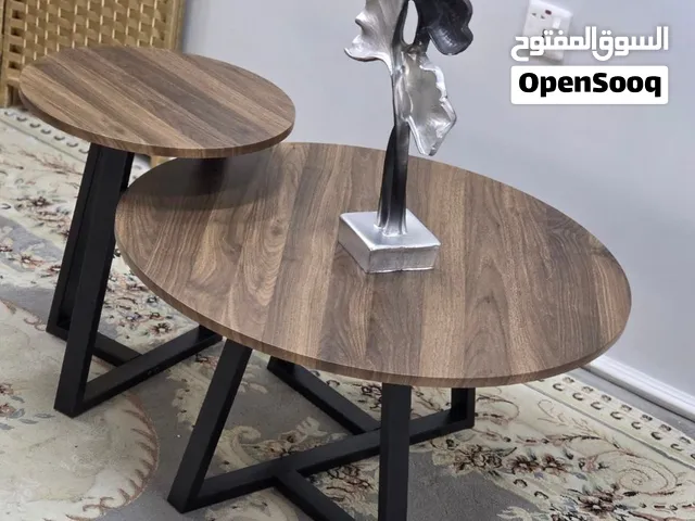لمسة عصرية تخلي صالتك غير شكل طبلة وسطية قطعتين – خشب + رجل حديد تصميم أنيق متداخلة وتوفر