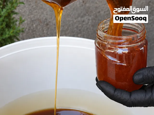 عسل طبيعة 100٪ افحص وين ما بدك انا عندي منحلة وبتسبب منها والله ما بيني وبينك ربي يرزق الجميع هي