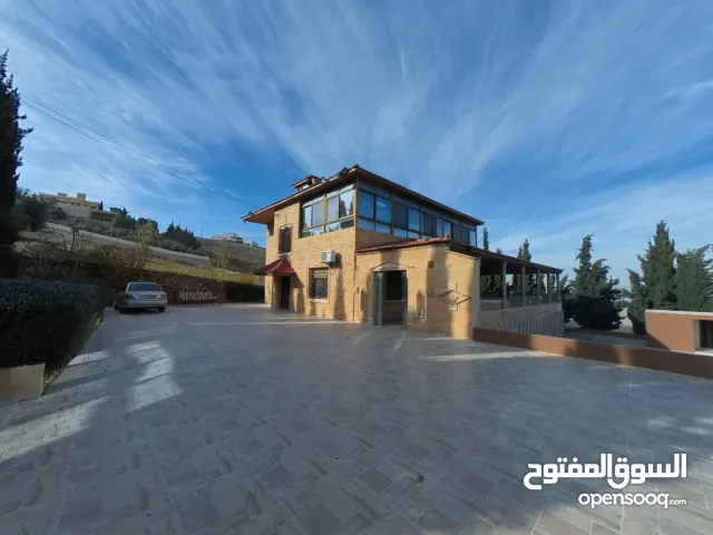 مزرعة وفيلا مميزة باطلالة خلابة في ام الدنانير خلف جامعة عمان الاهلية وكافيه جبل للبيع او البدل