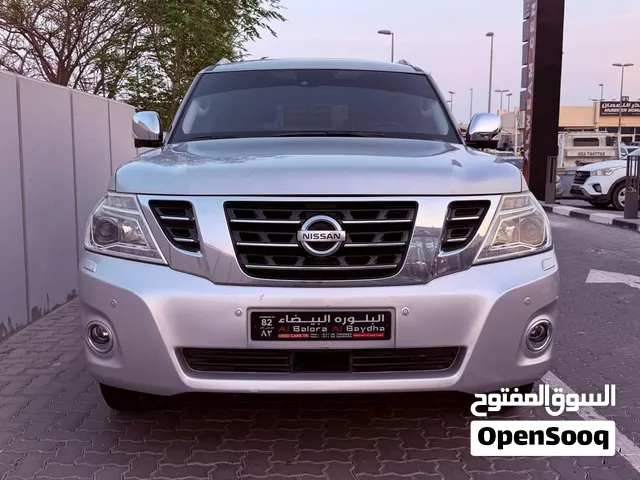 نيسان باترول المكينه الكبيره v8 بلاتينيوم رقم واحد داخل لون الزعفران موديل 2014