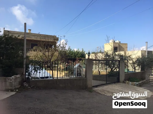 land with building for sale