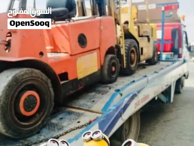 جرار لنقل المركبات والمعدات