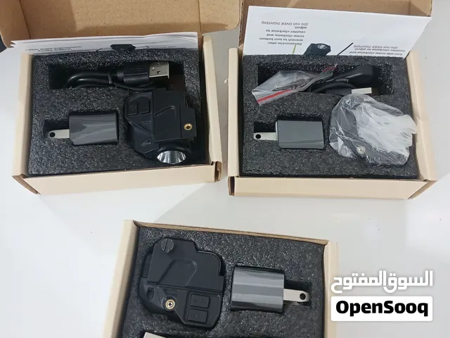 كشاف ضوئي مع ليزر