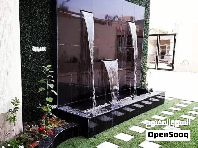 تنسيق حدائق شلالات ونوافير عشب طبيعي أشجار نباتات بجميع انواعها عشب صناعي بديل الخشب مظلات حدائق