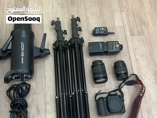 كاميرا كانون 70 d مع  جميع ملحقاتها والعدسات و إضاءة  فلاشات لتصوير