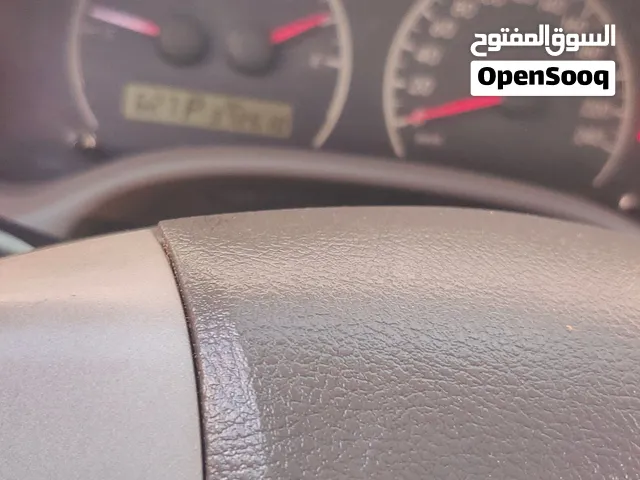 كرولا 2010 جير اوتوماتيك جامات عادية اللون ابيض
