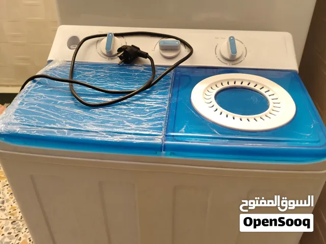 غساله ملابس أطفال وكامره مراقبه