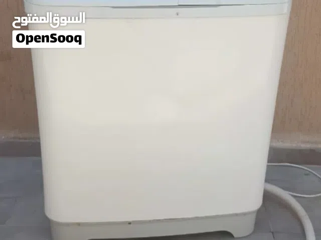 غسالة بنت وامها