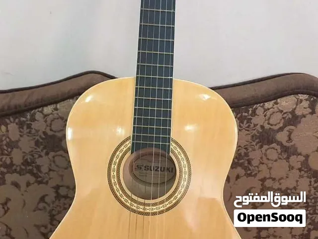 جيتار Suzuki كلاسيكي للبيع – جديد جيتار كلاسيكي من نوع Suzuki، بحالة ممتازة جدًا جديد ولم يتم استخدا